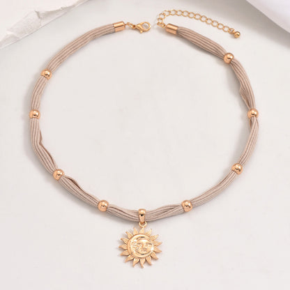 Sun Face Pendant Cord Necklace